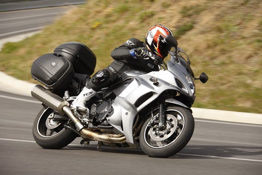 2017 a man riding in his silver motorcycle in Three Bridges, New Jersey